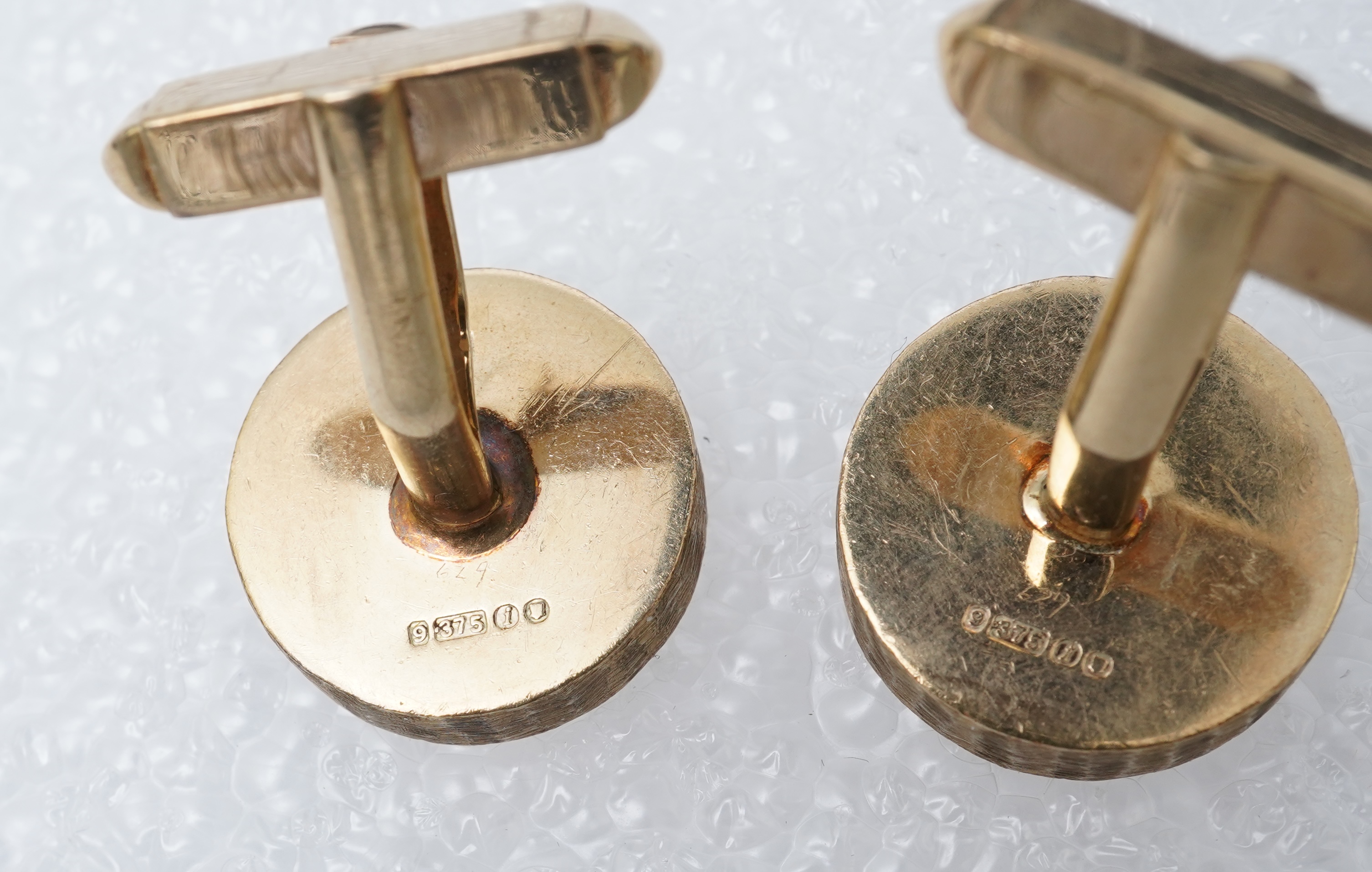 A pair of gold cufflinks, circa 1964